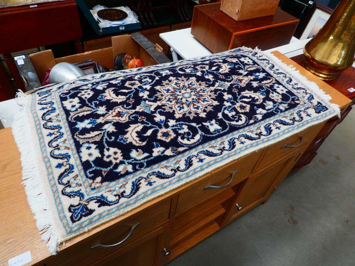 Floral patterned woollen mat