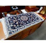 Floral patterned woollen mat