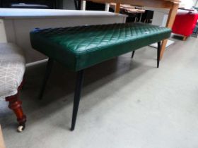 Green padded seat on spindle legs
