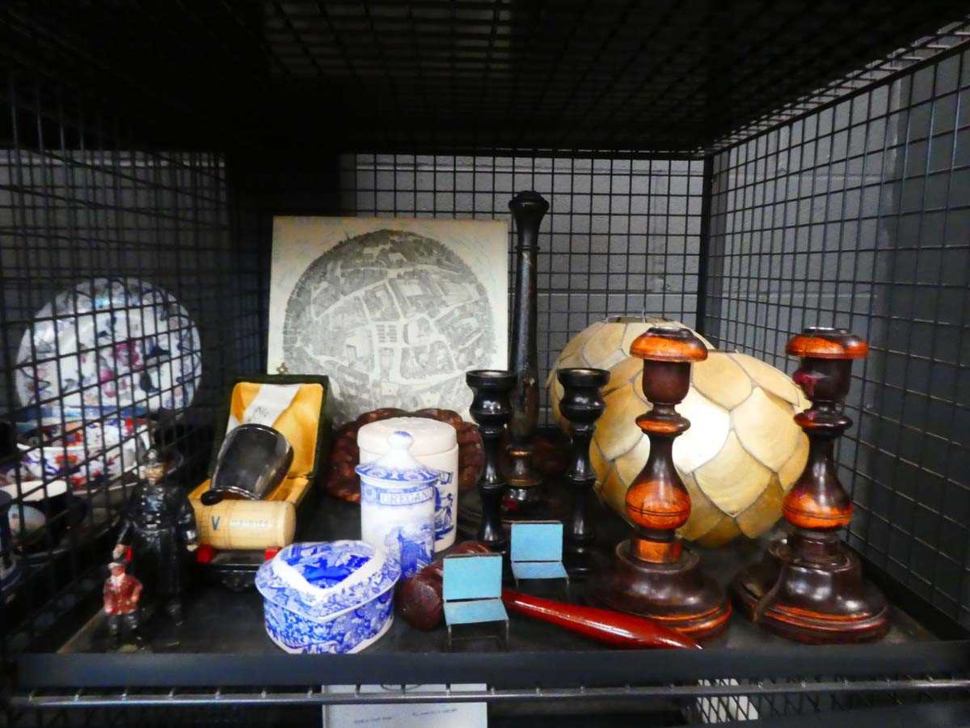 Cage containing chinoiserie lamp, candlesticks, gavel, toy figures etc