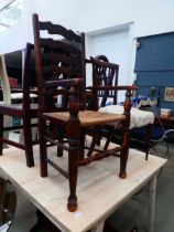 Two 18th century elm dining chairs, with a ladderback chair and parlour chair