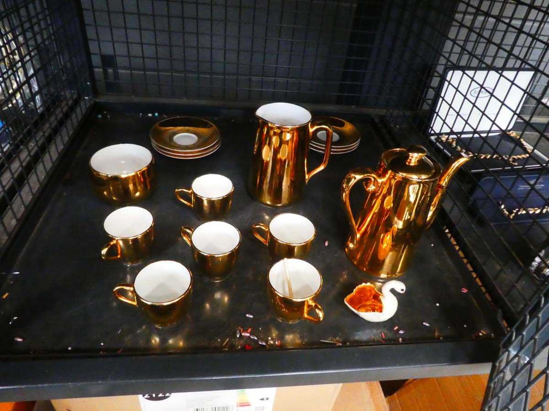 Cage containing Royal Worcester lusterware coffee service