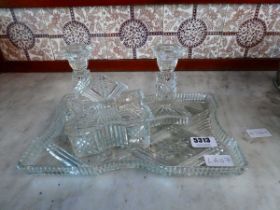 Moulded glass dressing table tidy comprising tray, lidden pot and pair of candlesticks