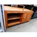 Jali entertainment unit with door and shelf under
