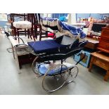 Vintage Wilson pram in blue with additional covers and peace decorated cover