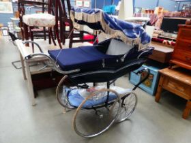 Vintage Wilson pram in blue with additional covers and peace decorated cover