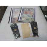 (1) 2 folders of bank notes, Royal Wedding souvenir coins, and others, plus folder of coins