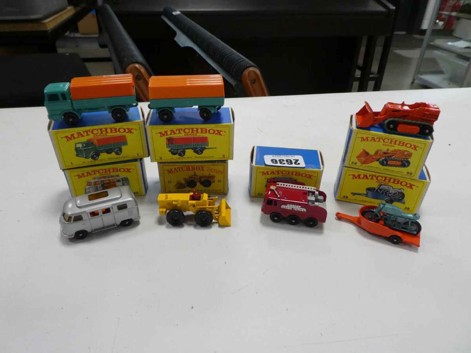 Box containing 7 boxed matchbox vehicles