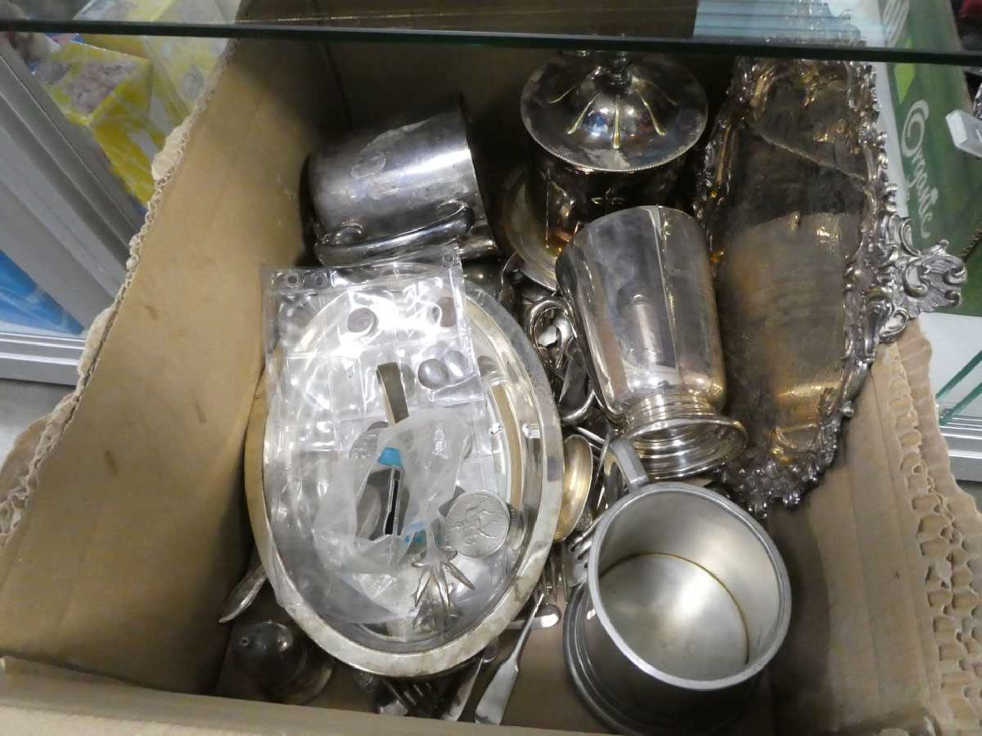 Box containing coins, pewter tankards, cutlery, etc.