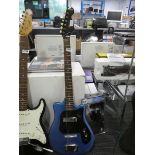 Blue and black electric guitar