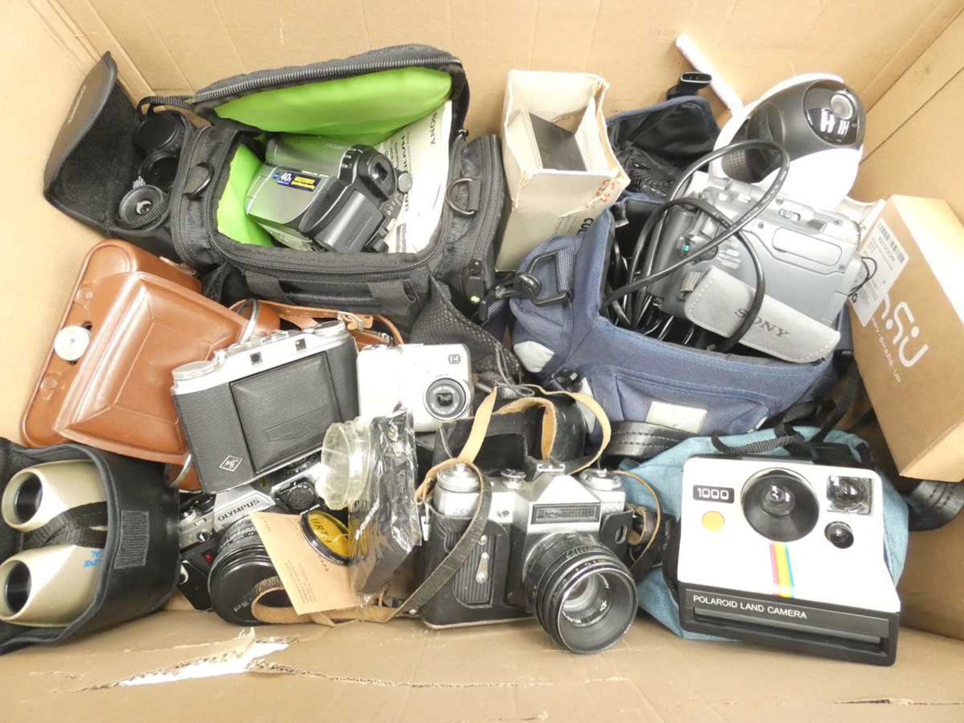 +VAT Box containing vintage film cameras, Polaroid camera, camcorders, camera accessories,