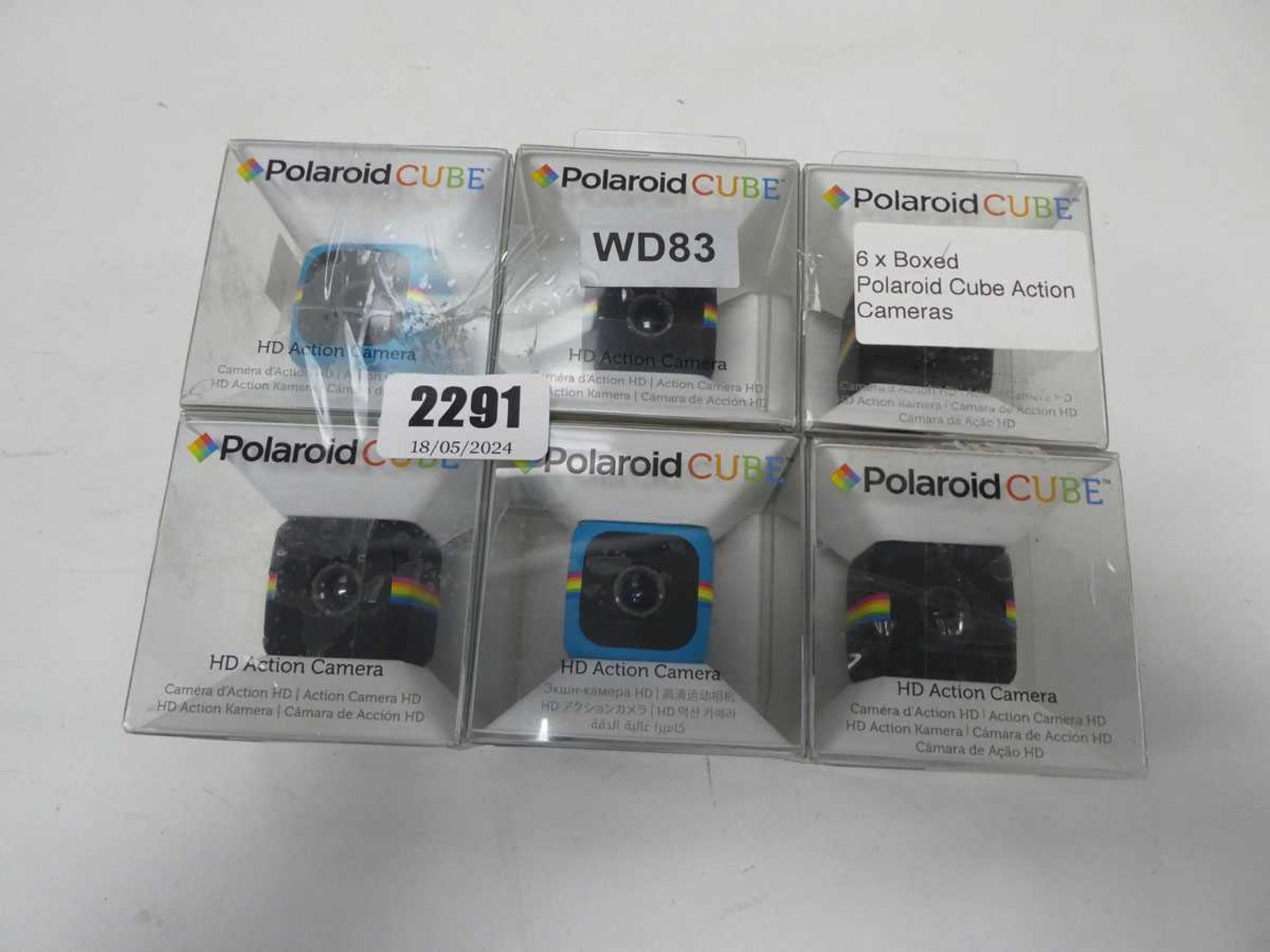 6 boxed Polaroid Cube action cameras