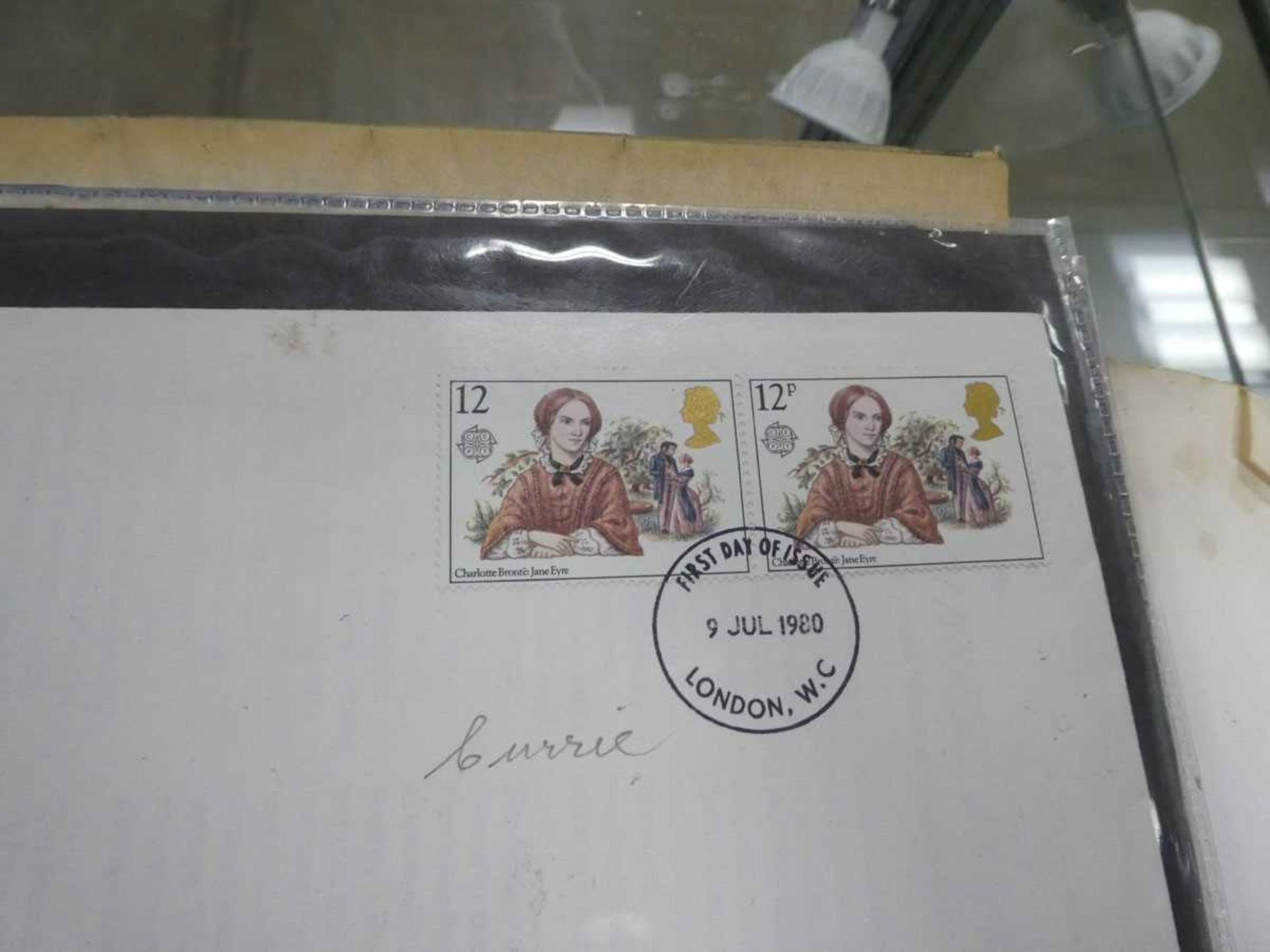 Folder containing first day covers inc. one with printing error on Charlotte Bronte 12p stamp, - Image 4 of 4