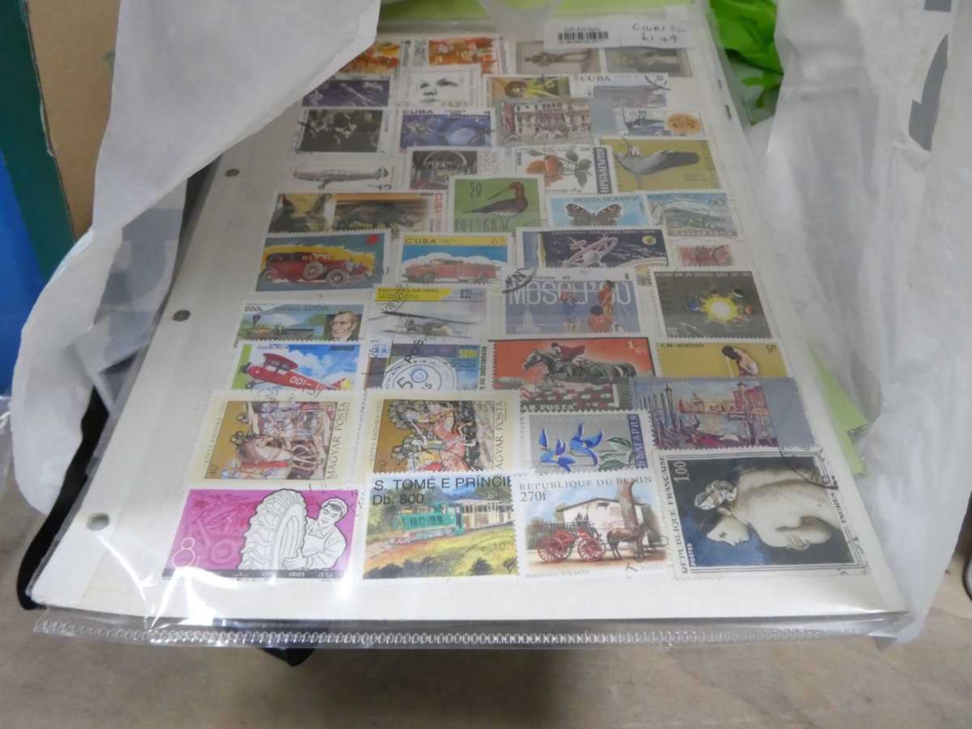 Box and bag containing various stamps