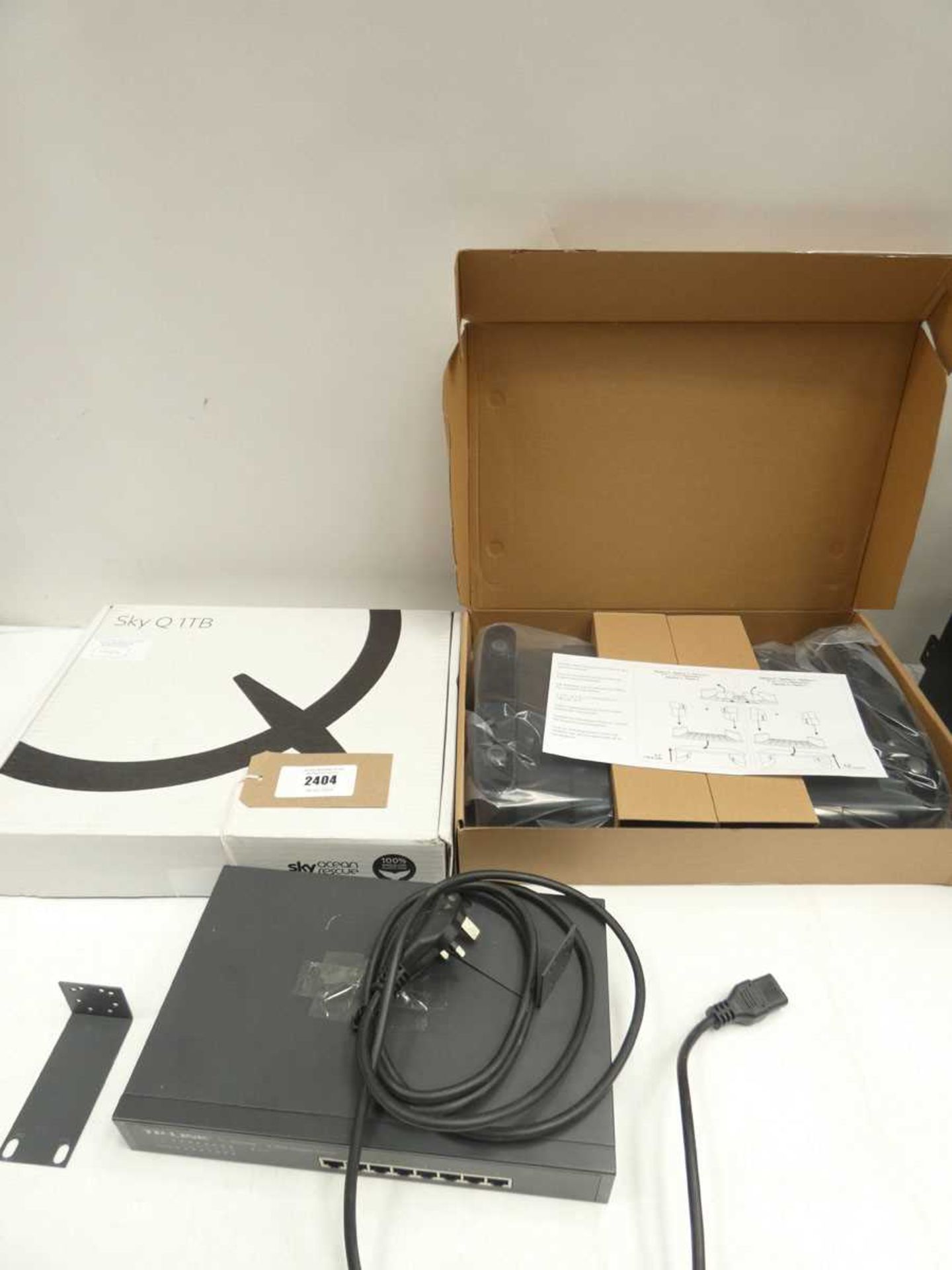 +VAT Sky Q 1TB, TP-Link 8-port switch and monitor raiser