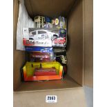 Box containing diecast vehicles