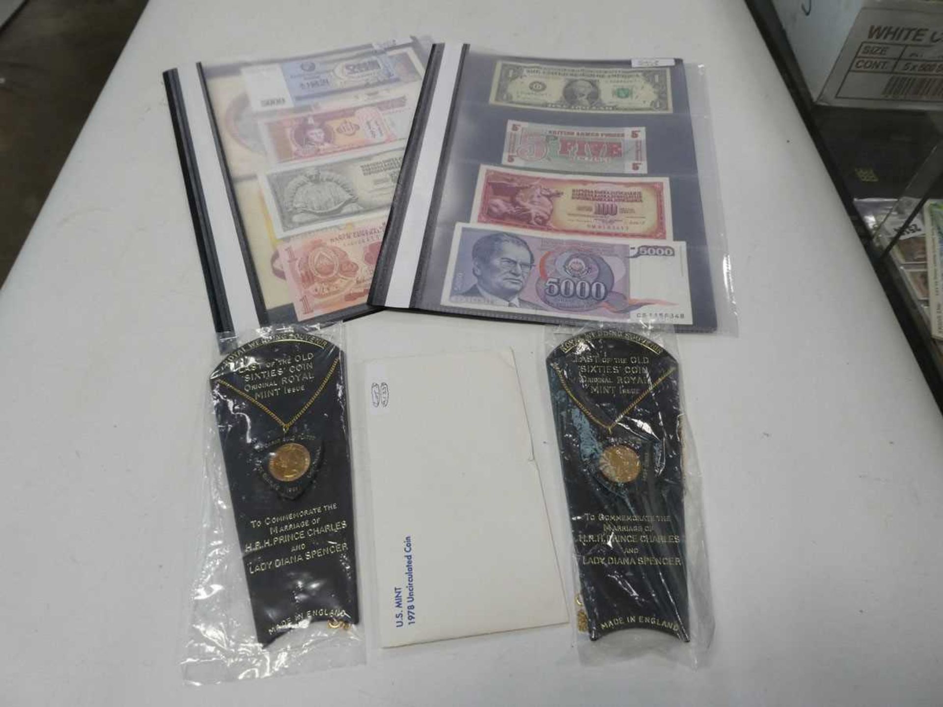 (3) 2 folders of bank notes, 2 Royal Wedding souvenir coins, and other coins