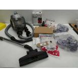 +VAT Shark vacuum head, Russell Hobbs Compaxt X5 vacuum cleaner, filters, dust bags etc