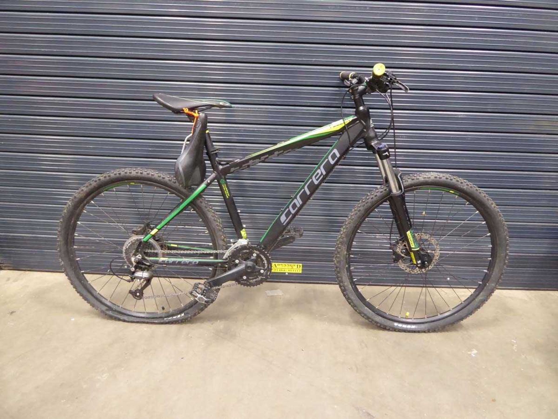 Carrera black and green mountain bike