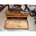 Carpenter's toolbox with a large quantity of assorted carpentry tools including planes, saws,