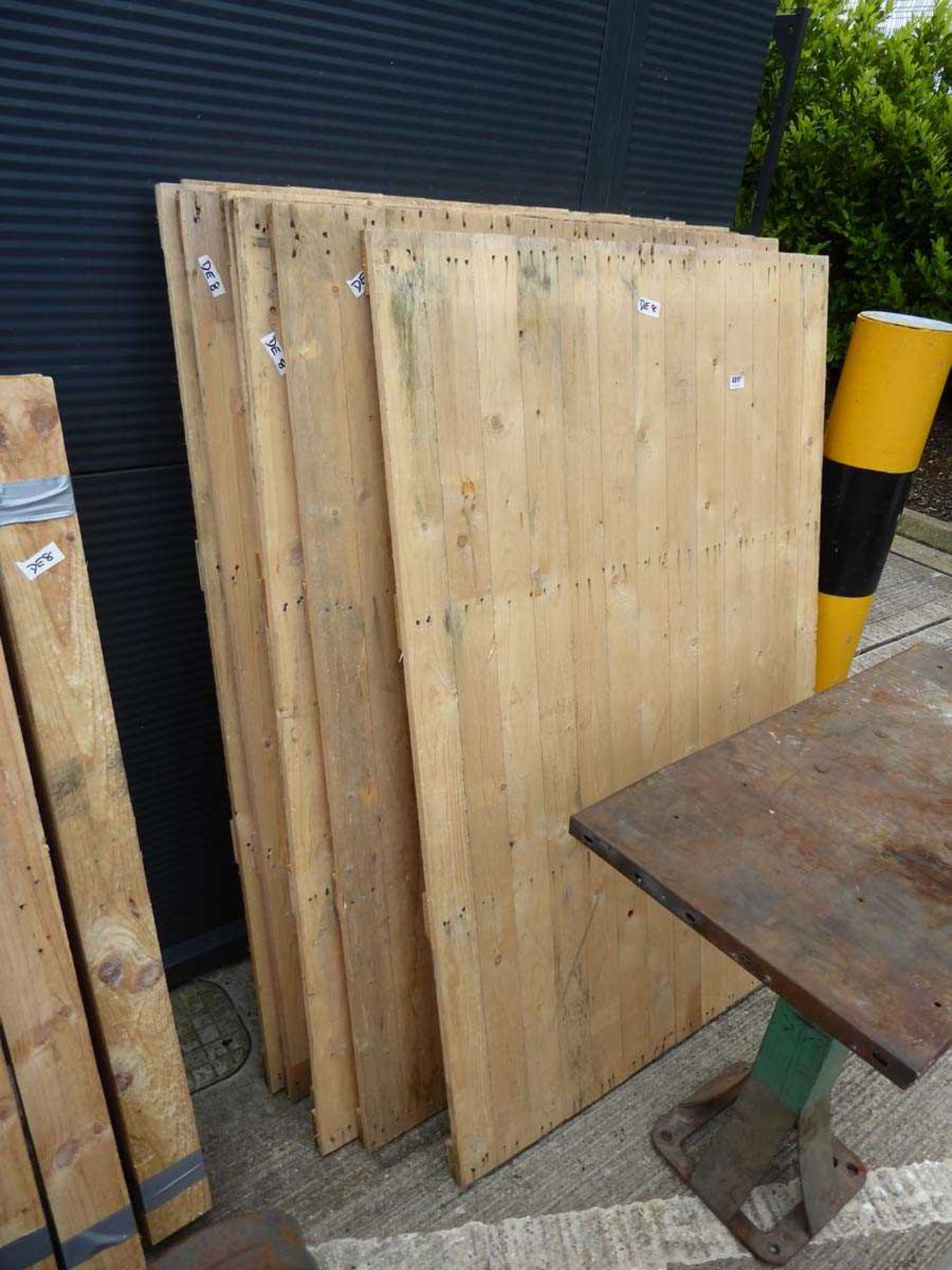 9 assorted narrow wooden panels