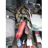 Beige and blue golf bag with assorted clubs