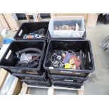 Pallet of vintage car parts including rear light lenses, brake pad, shoes, suspension bushes,