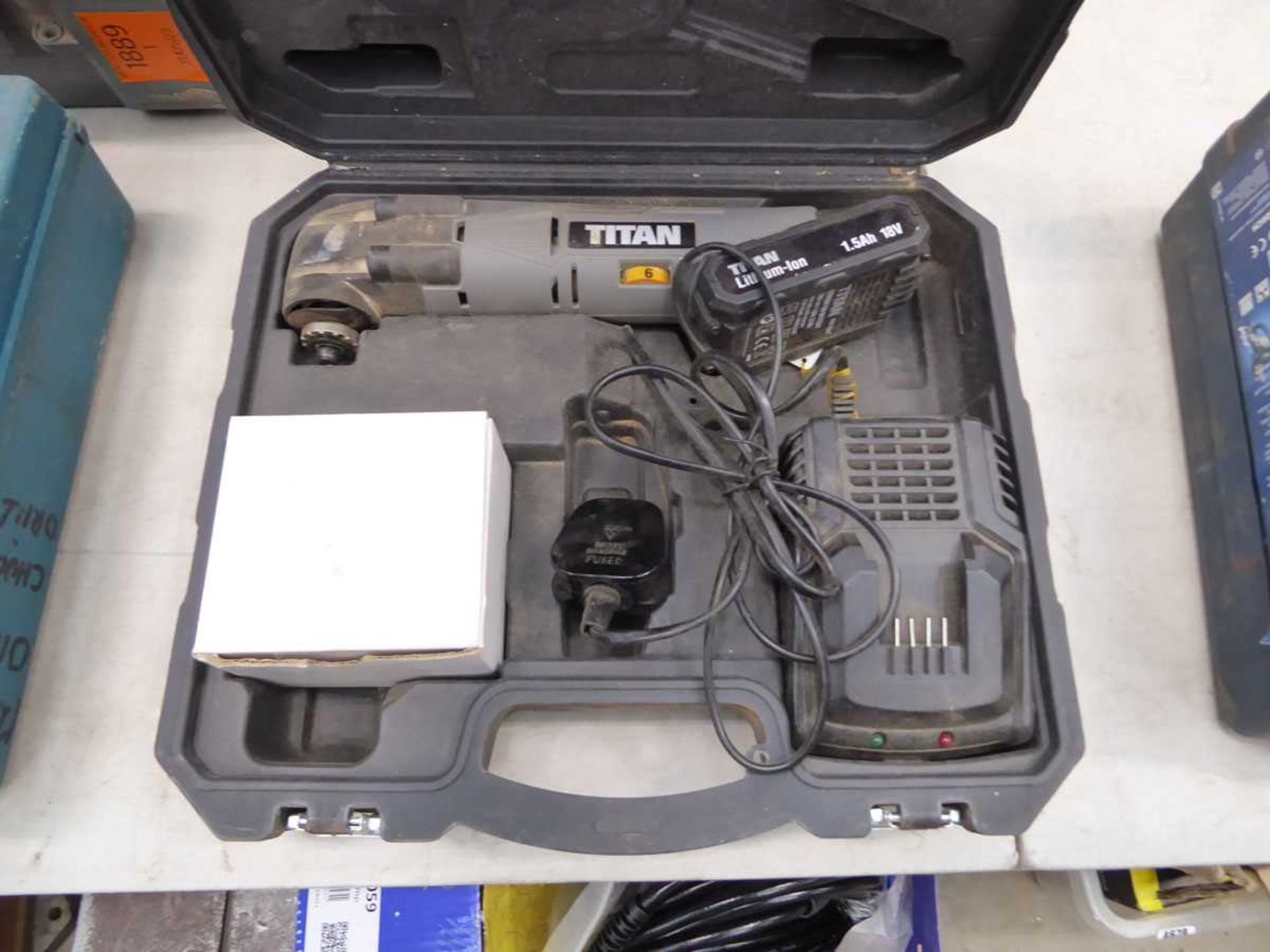 Titan multi tool with one battery and charger