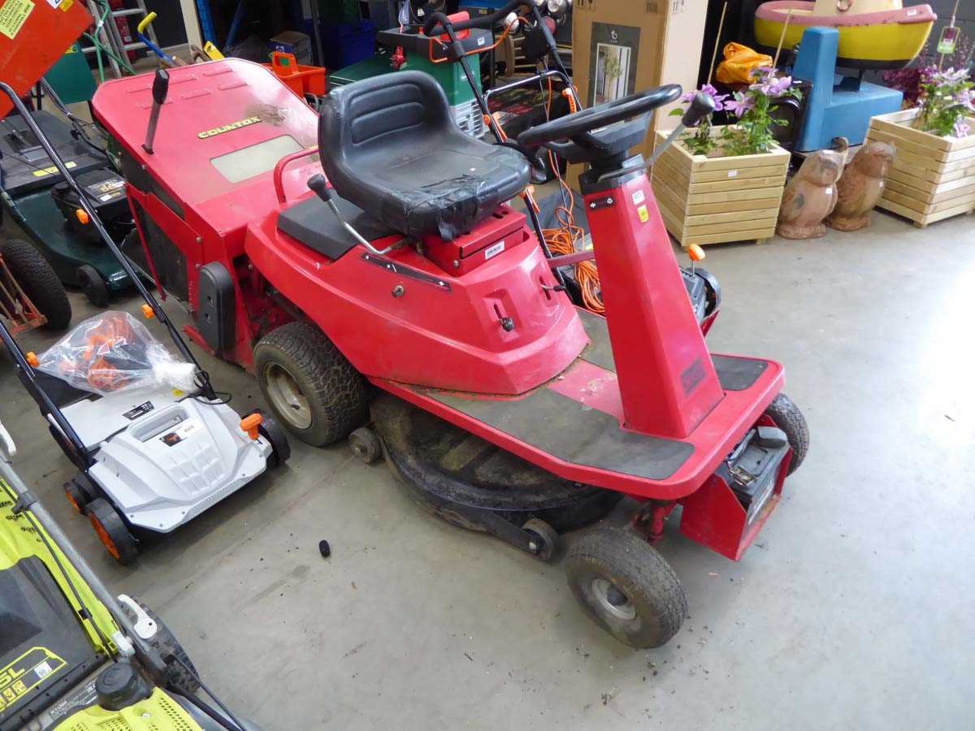 Countax petrol powered ride on mower with grass collector