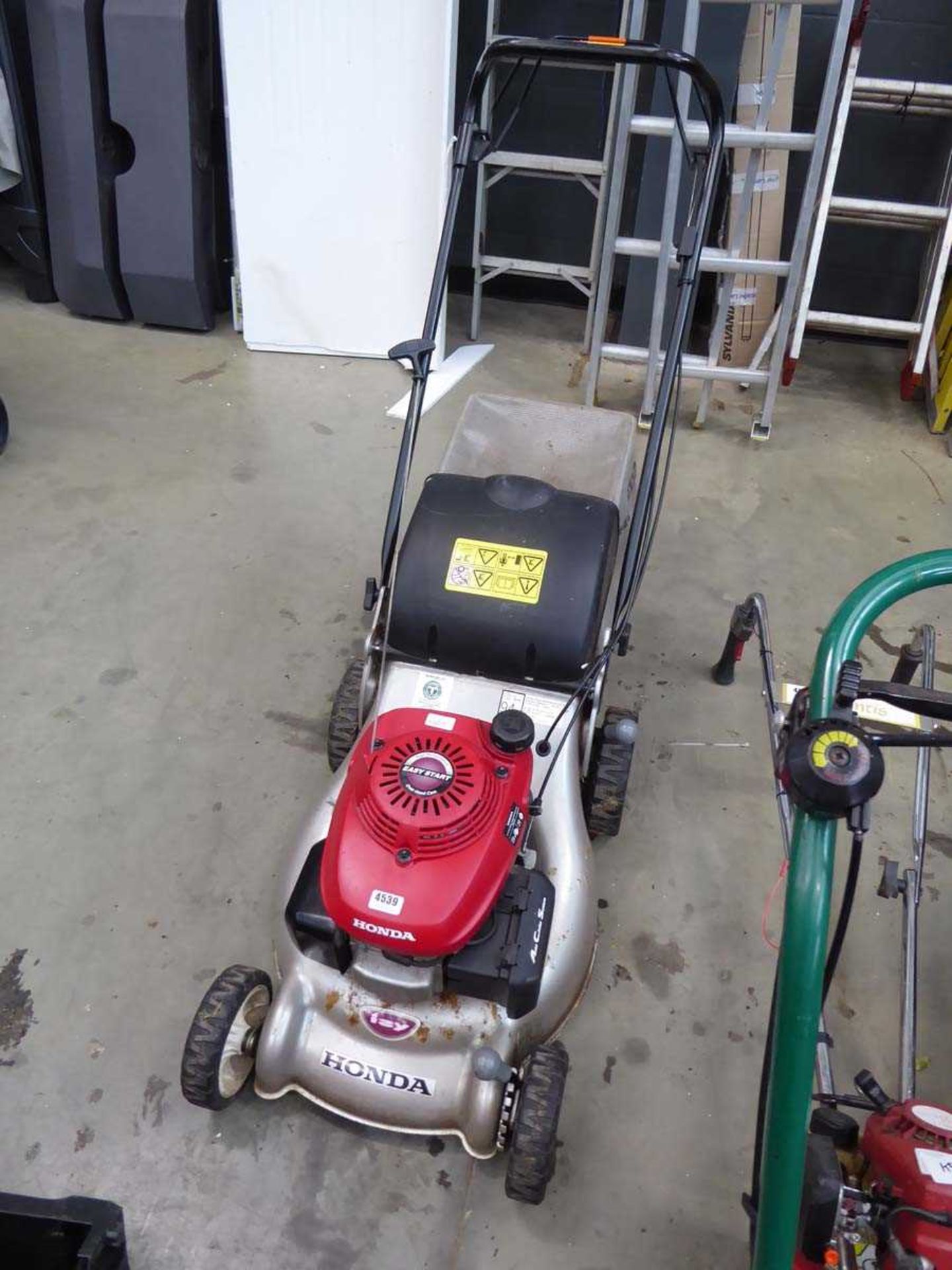 Honda Izzy petrol powered rotary mower with grass box