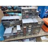 Quantity of small screw boxes with nuts, bolts, bearings, etc