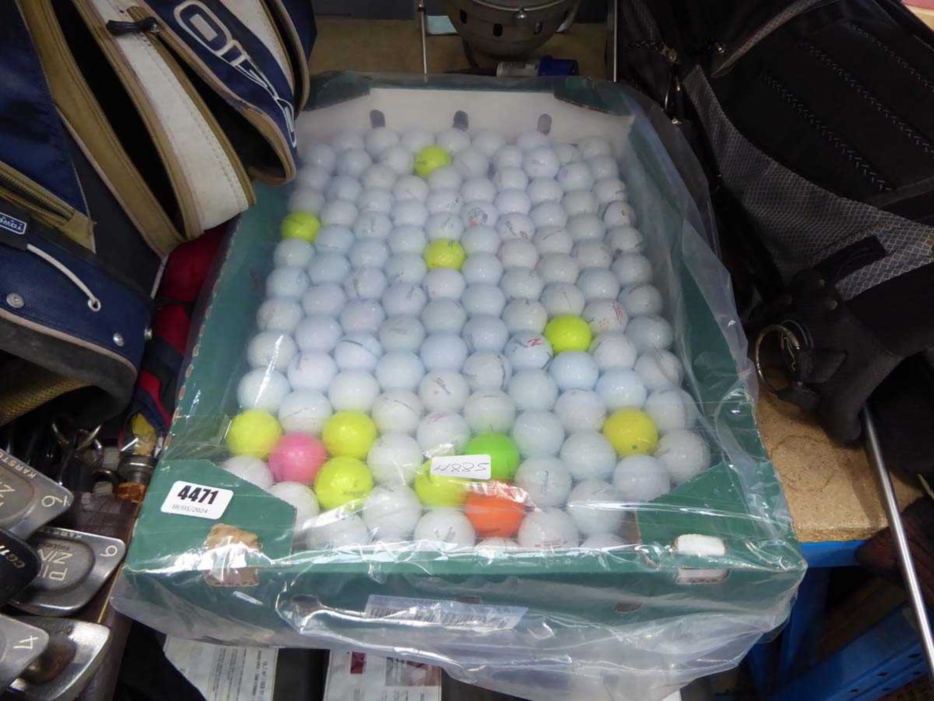 Box of assorted golf balls