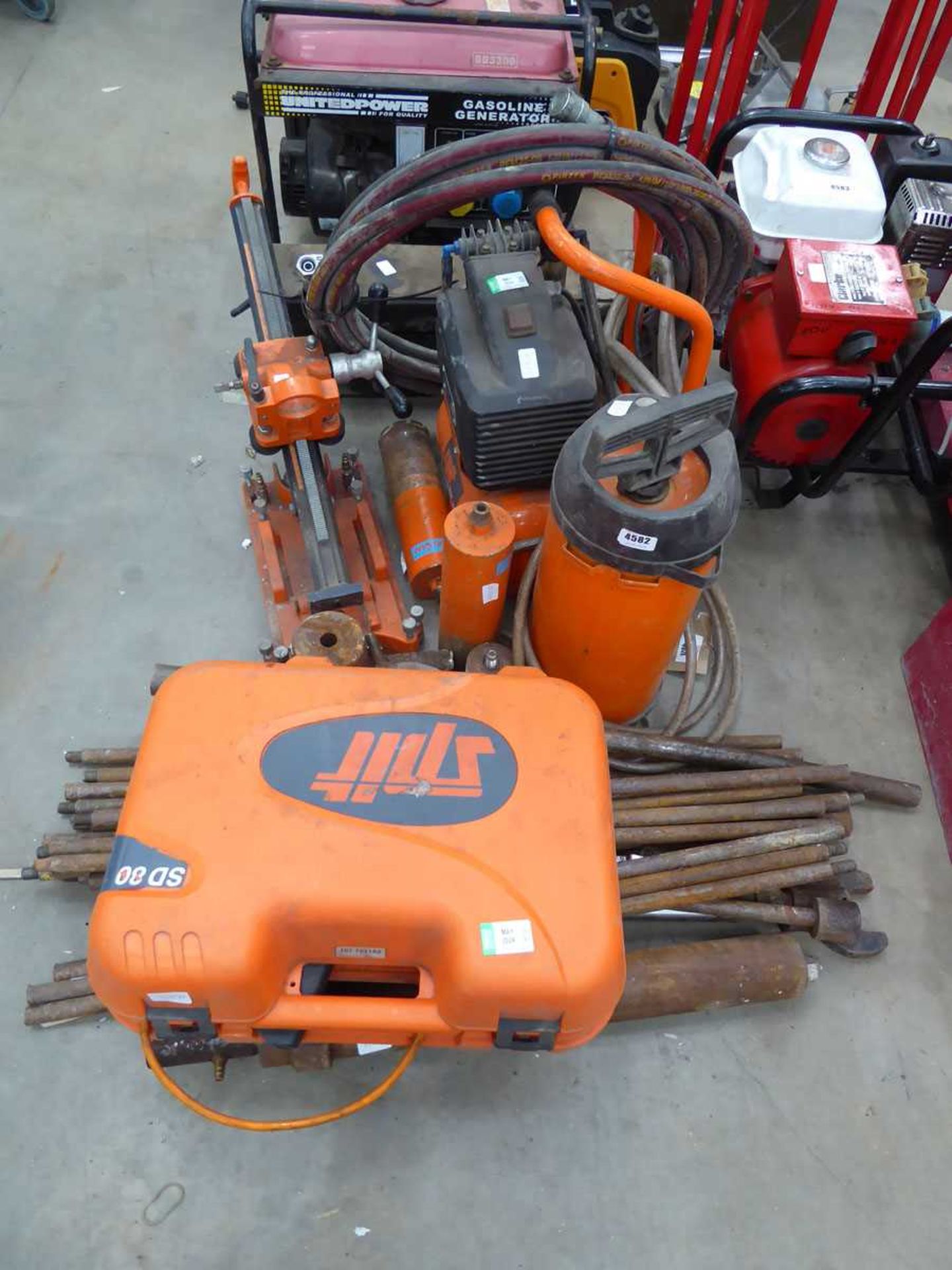 Large Spit SD80 core cutter complete with all relevant rods, attachments, compressor, etc