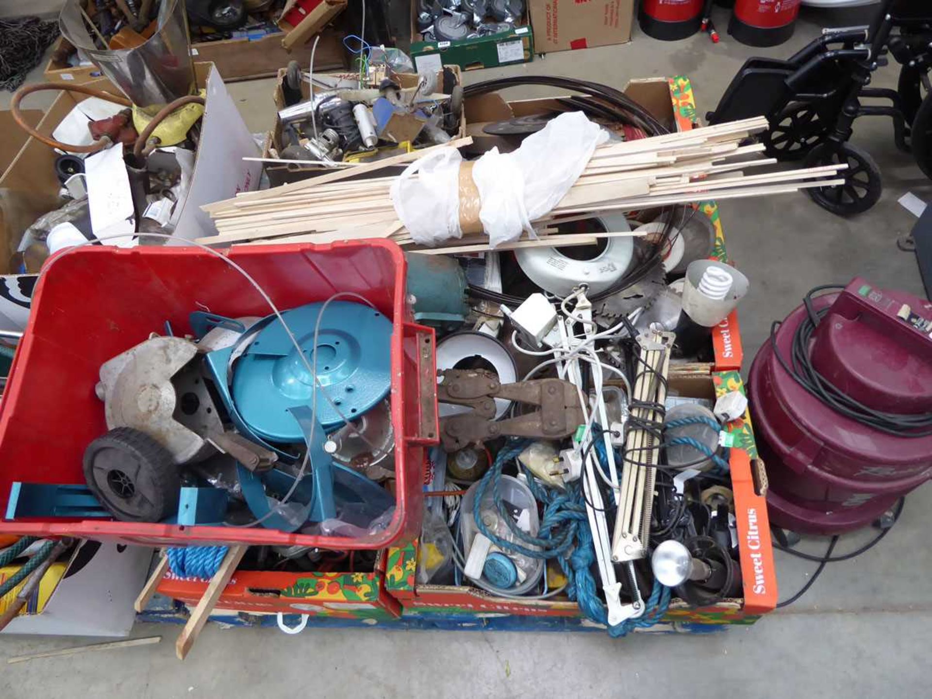 Pallet of assorted items including machine parts, wood, bolt croppers, angle poise lamps, lathes,