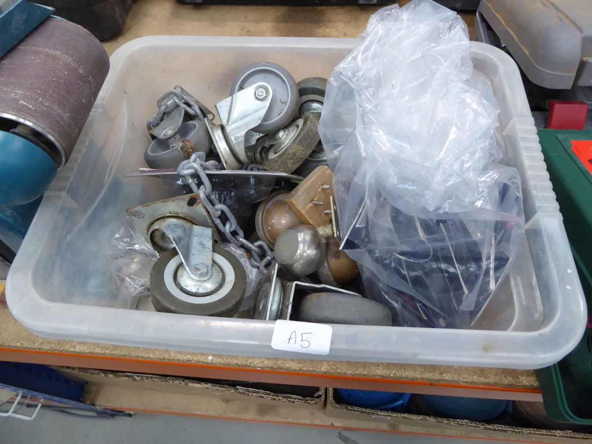 Box containing end sockets, castors, wheels etc