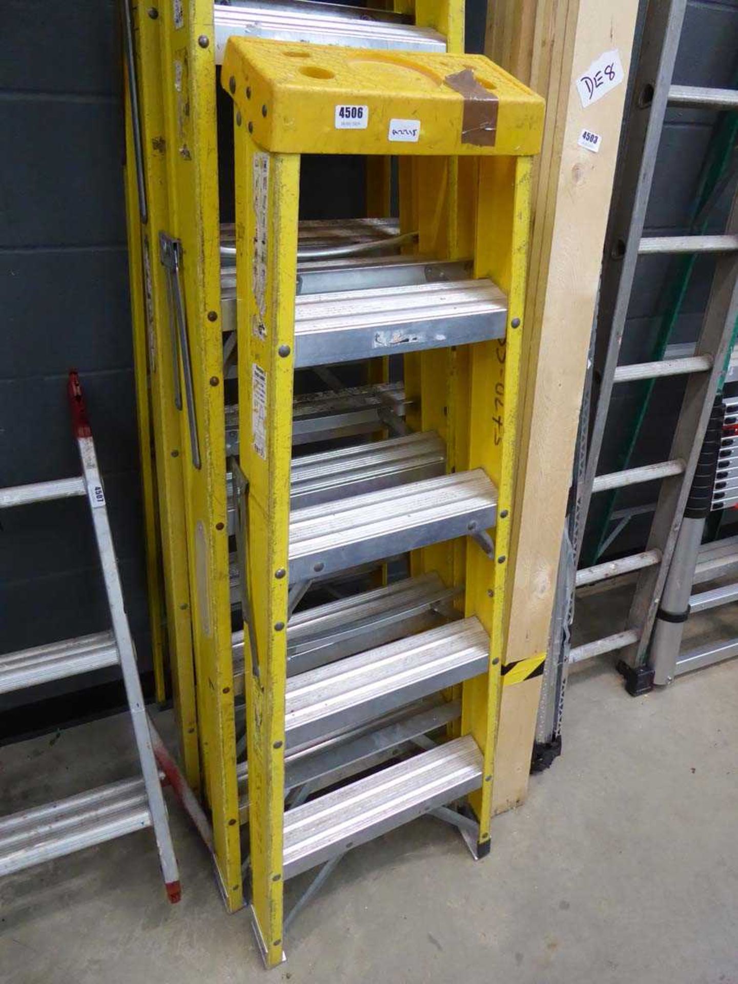 5 tread yellow and silver electricians style stepladder