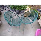 2 green string garden chairs