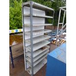 Multi shelf grey metal rack