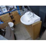 Oak effect bathroom vanity unit with mirror, toilet and sink