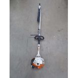 Stihl petrol powered long reach hedge cutter