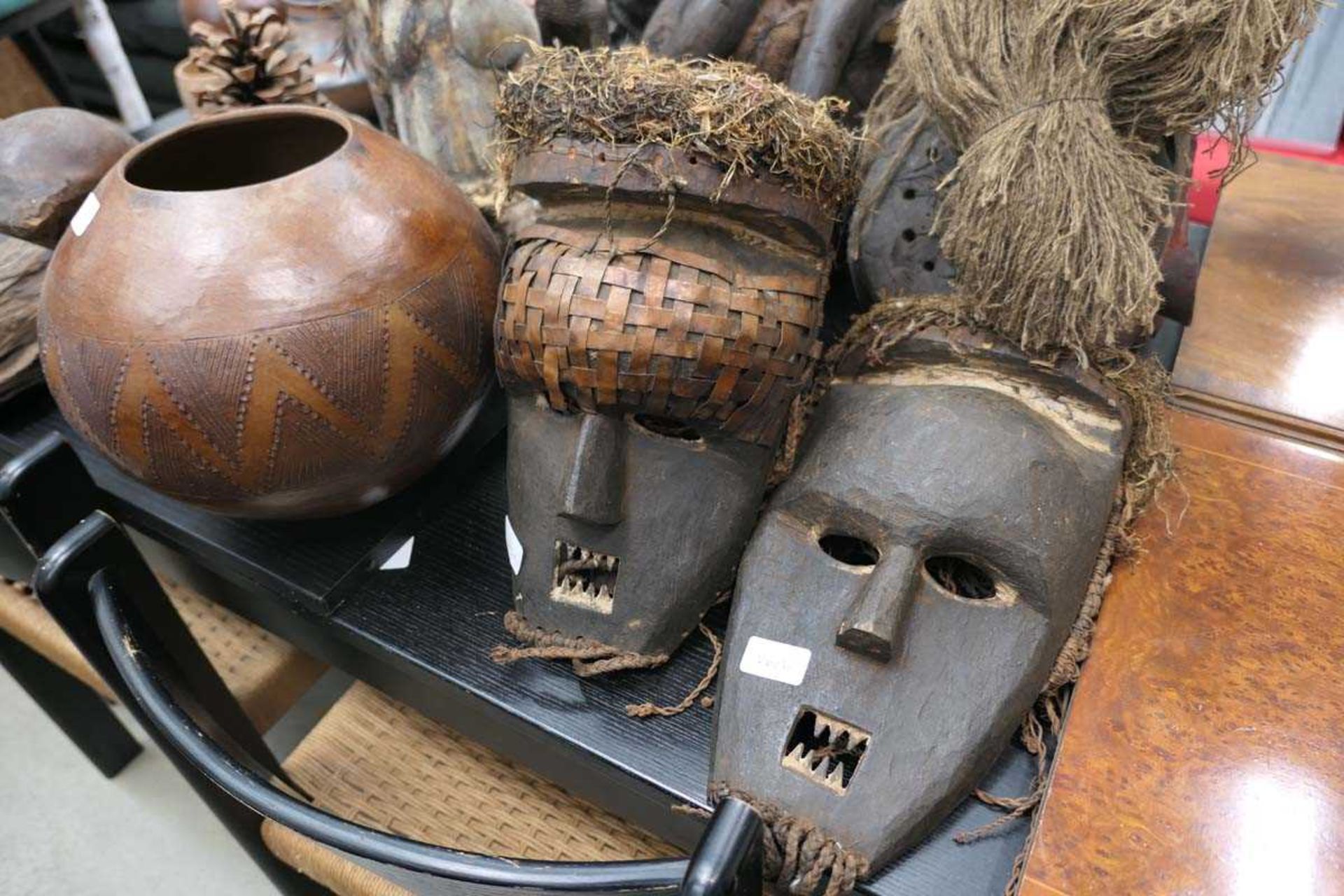Large quantity of wooden carved tribal masks and figures - Image 2 of 3