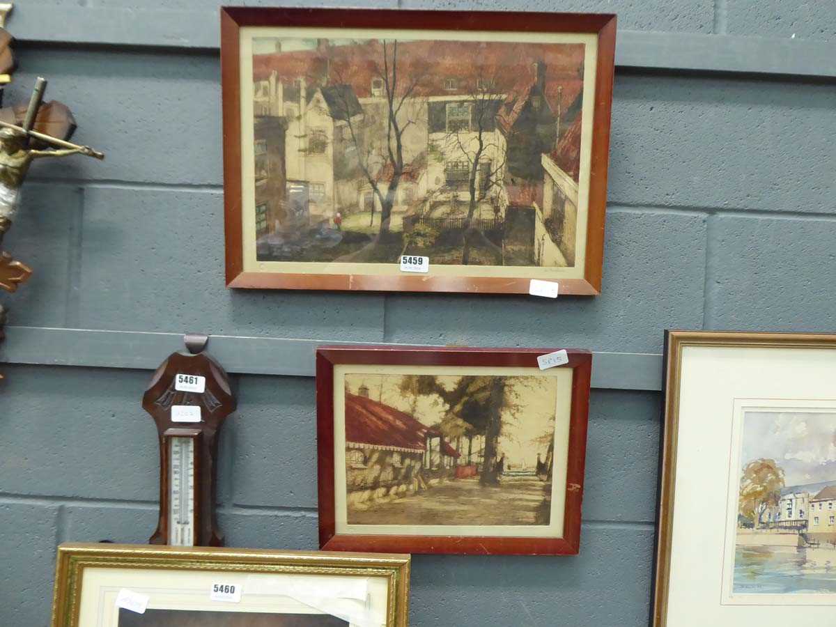 2 framed pictures of streetside scenes