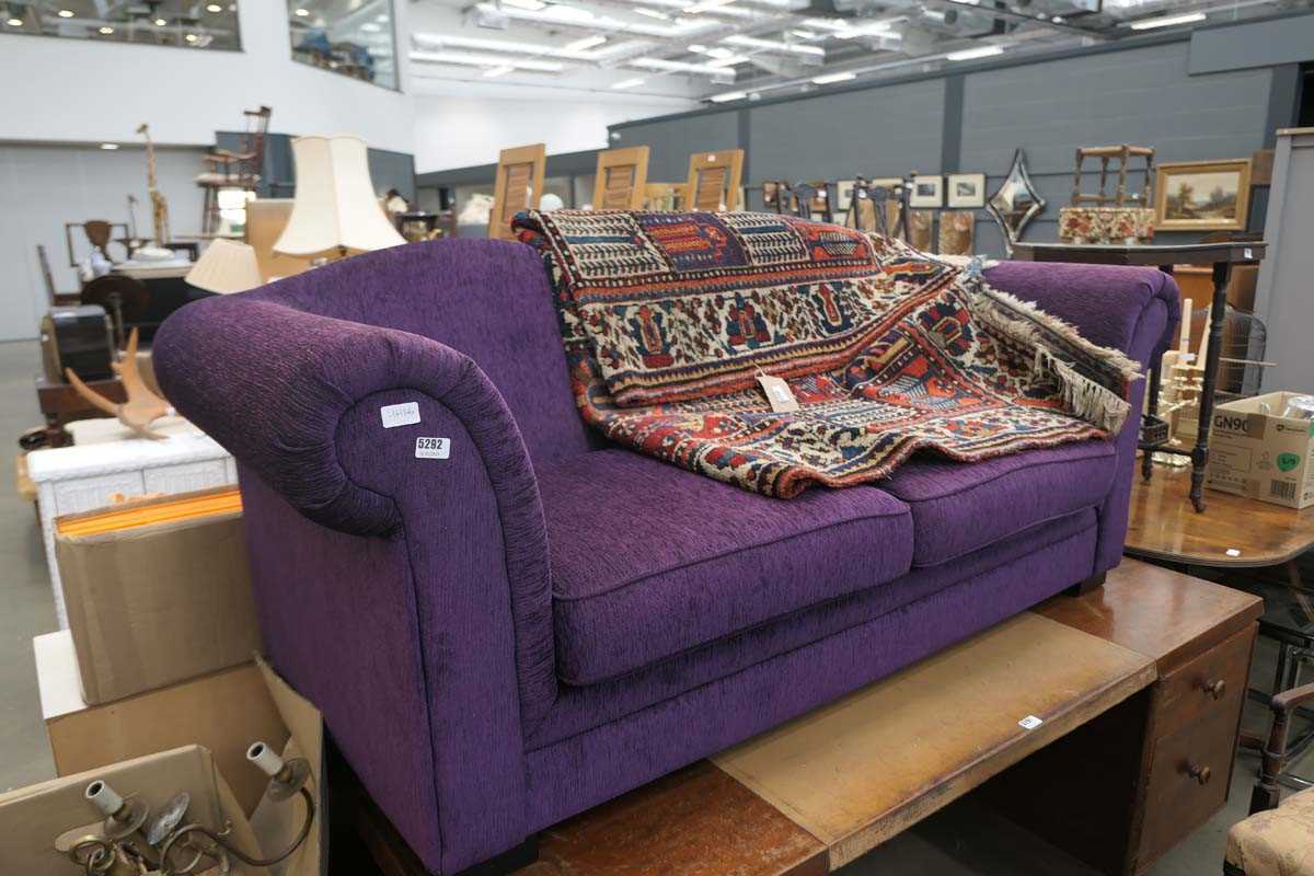 Purple two seater sofa