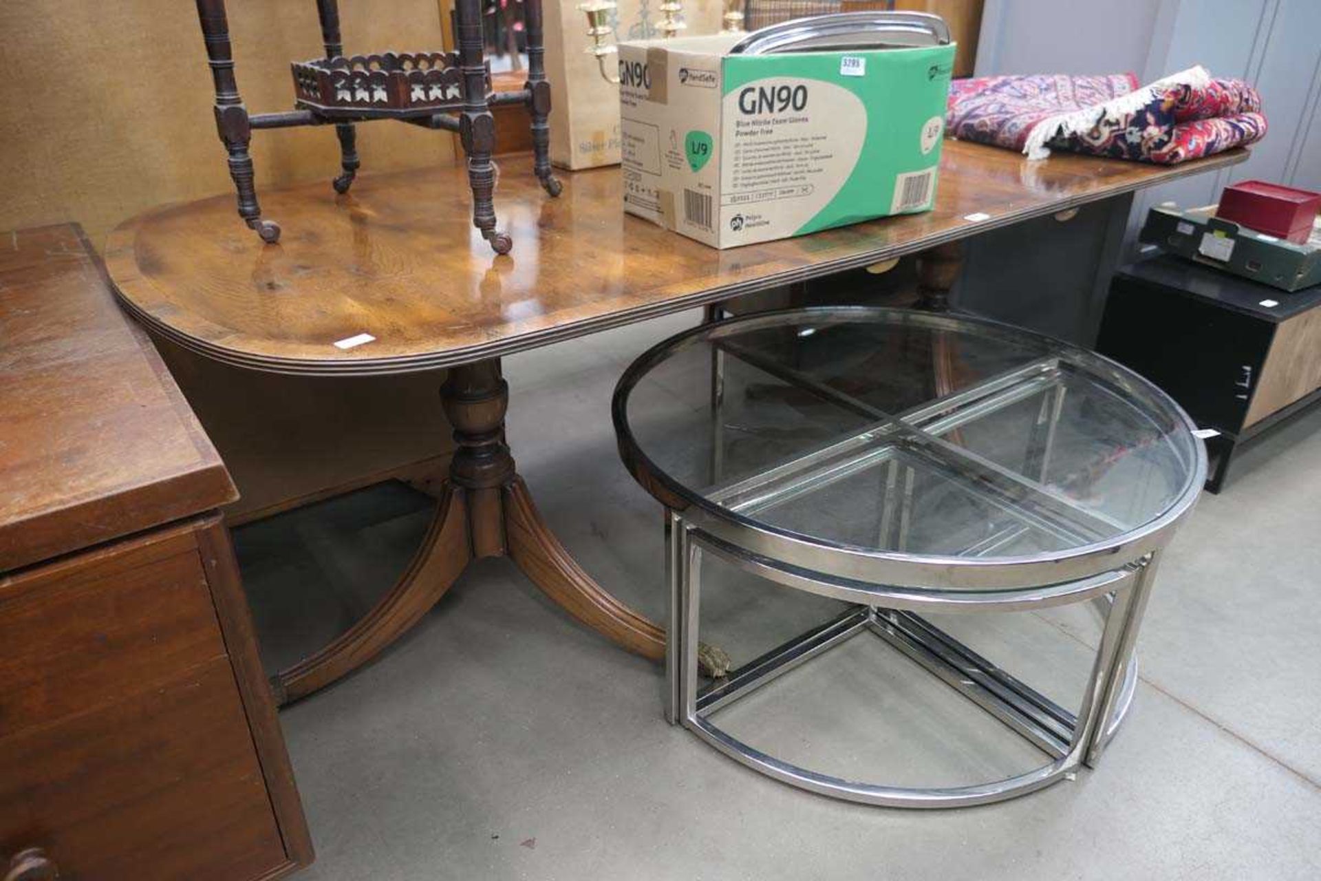 Oval dining extending table in walnut on 2 single tripod bases