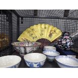 Cage containing made in China blue and white ware, ginger jar and a fan