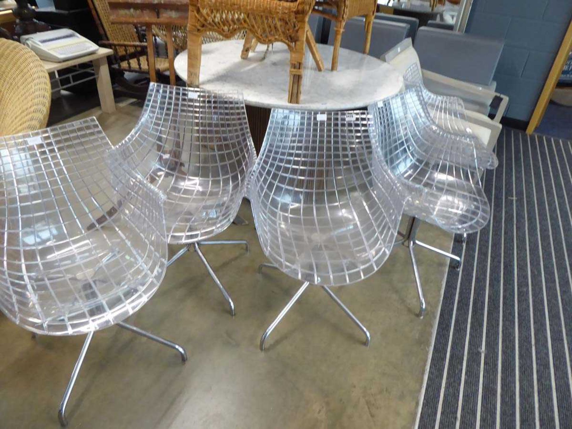 5 acrylic seated swivel chairs on chrome bases