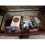 Brown suitcase containing books, viewers, repro toys and typewriter