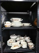 Two cage containing a quantity of Adam's china to include gravy boats, teacups, terrines etc