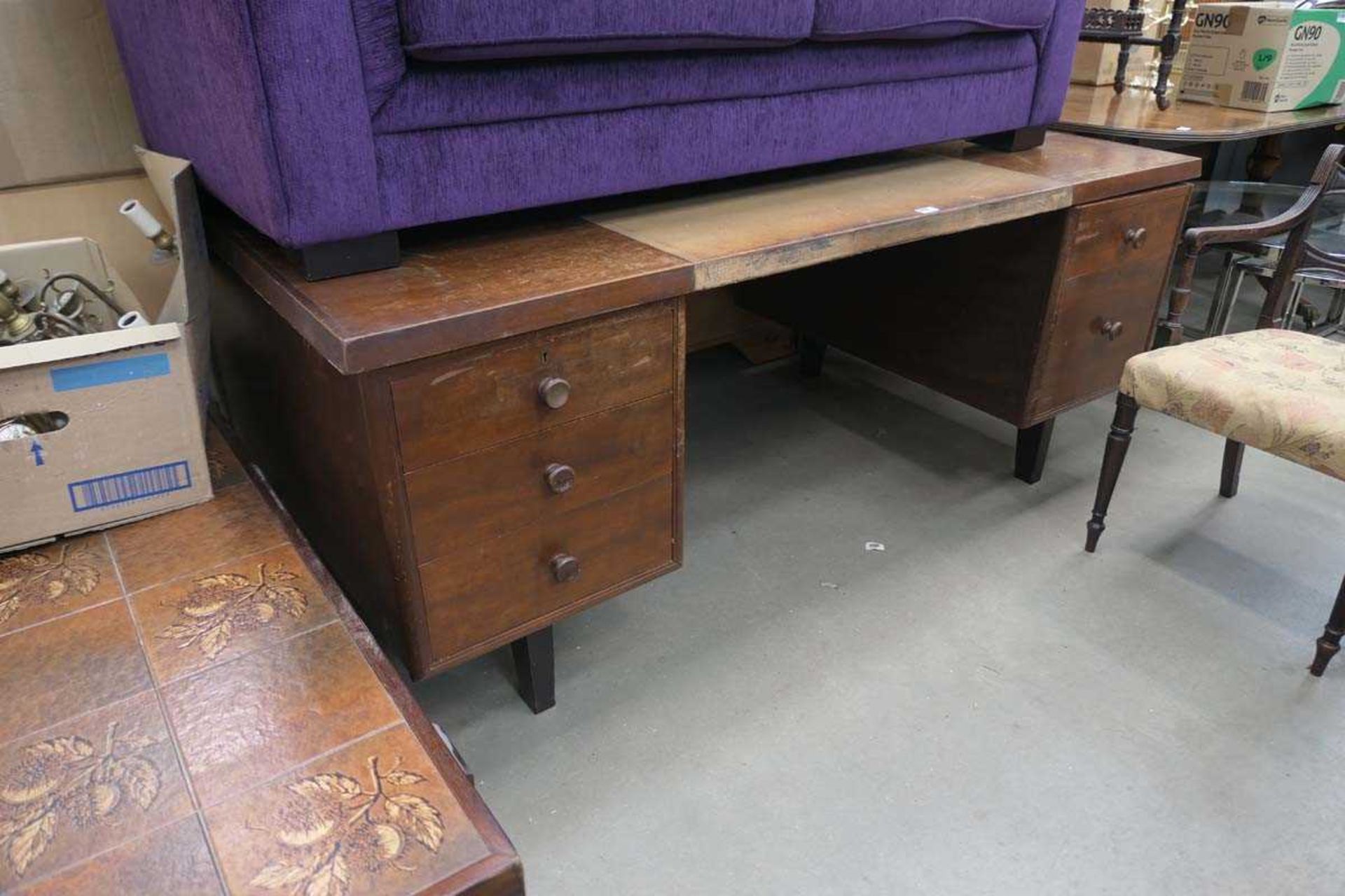 Dark wood desk with 3 drawer pedestals under and leather insert