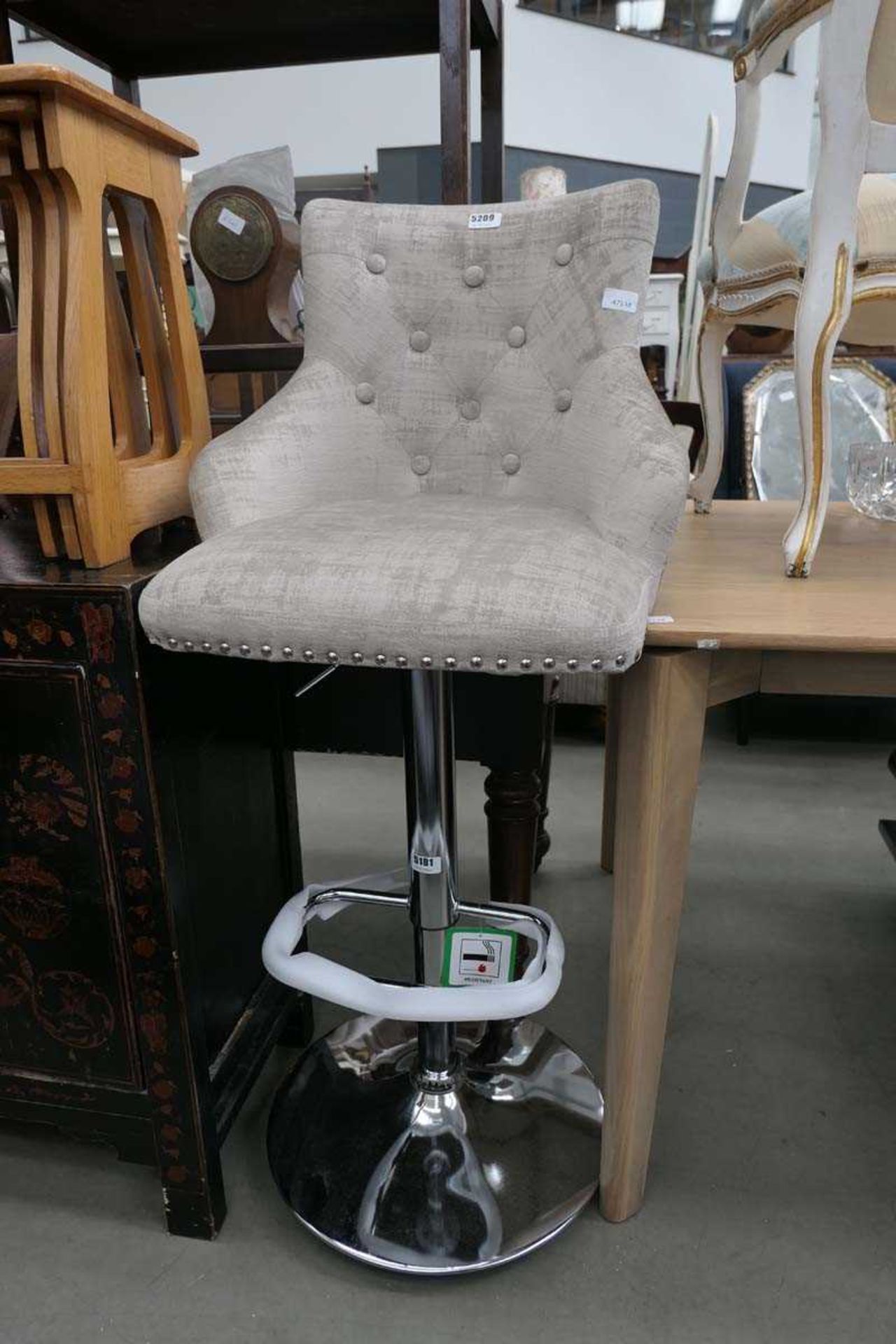 Grey cloth topped chrome based bar stool